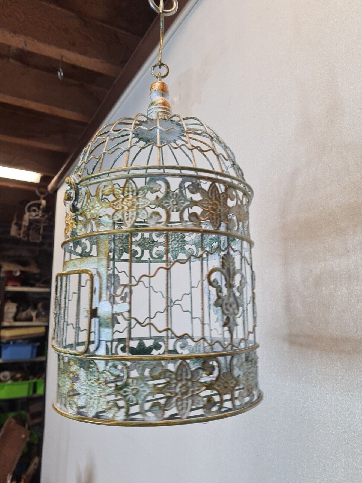 Round weathered iron birdcage