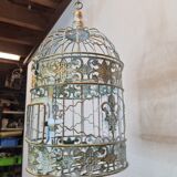 Round weathered iron birdcage
