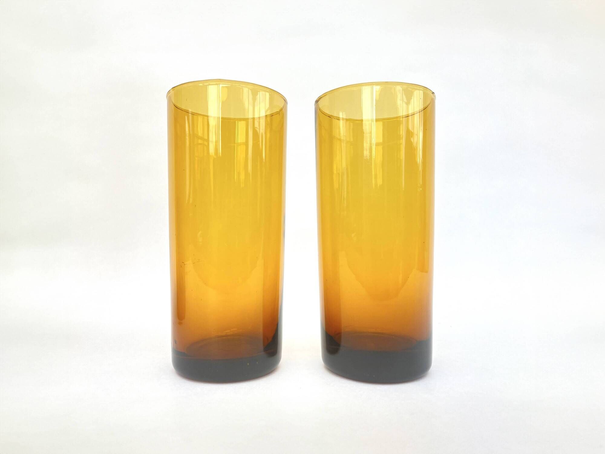 Carafe/pitcher and two amber glasses • Blown glass • France • 1970s