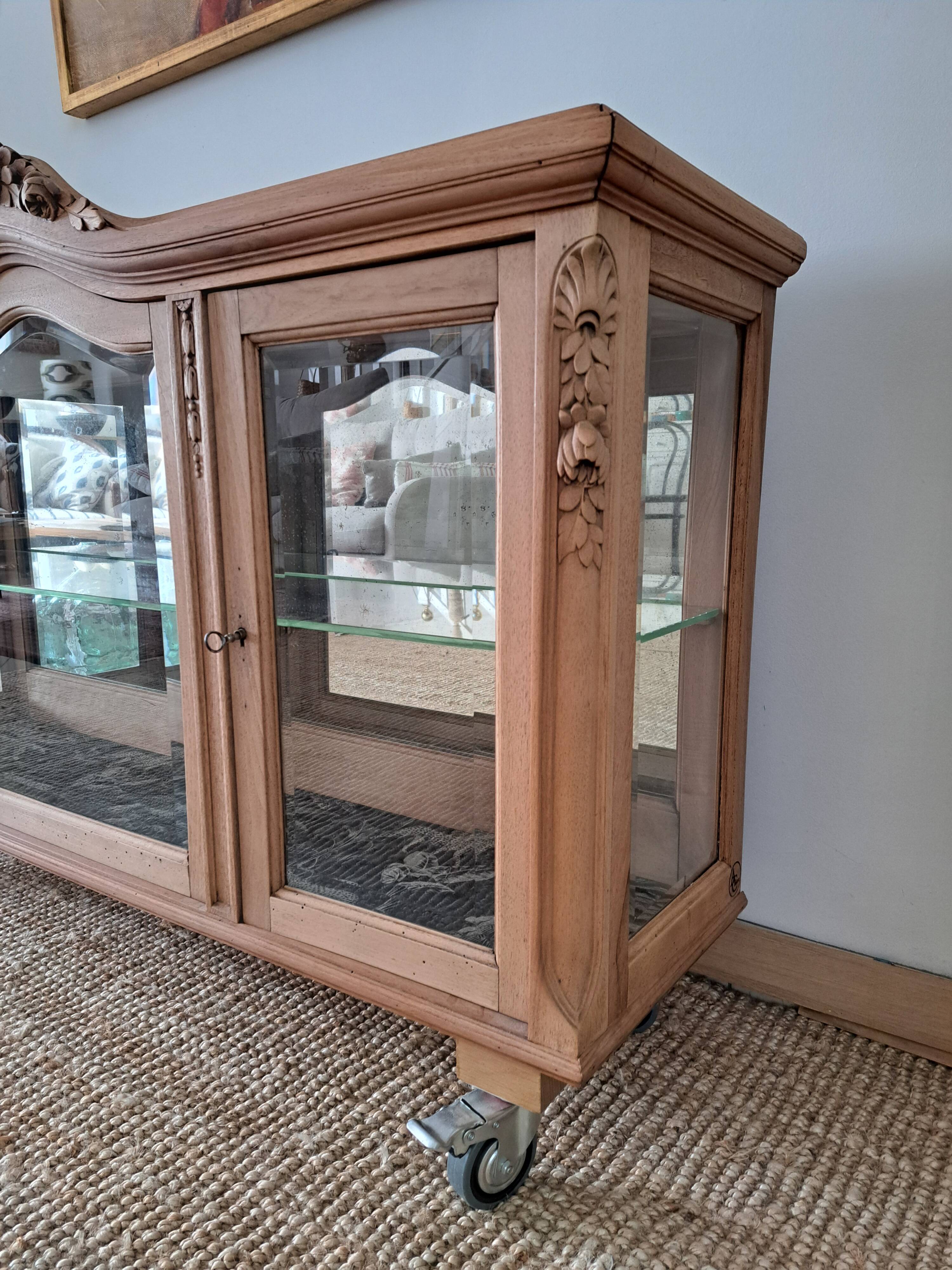 Vintage display cabinet in light wood