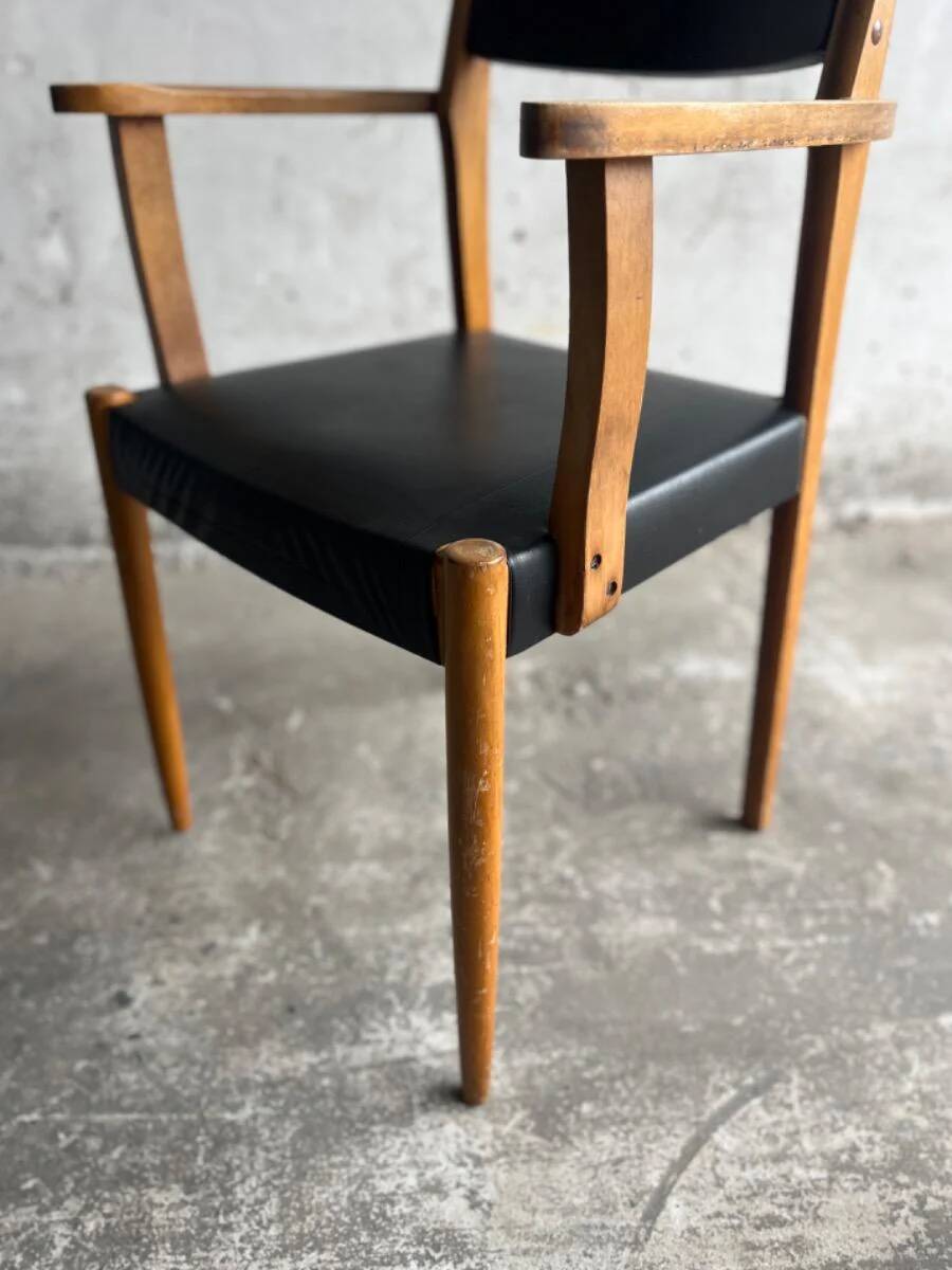 Set of 2 vintage beech wood armchairs with black skai upholstery — mid-century modern