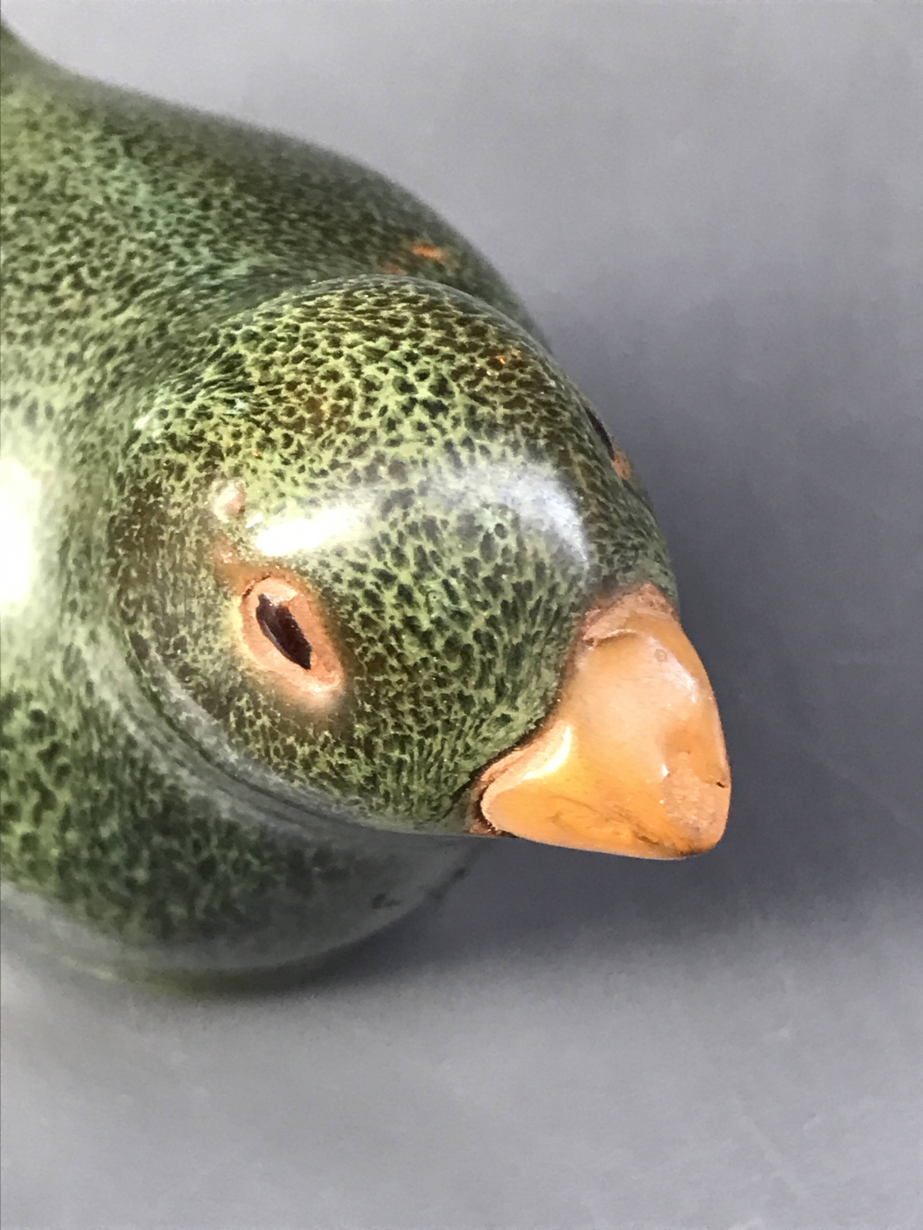 Green ceramic bird