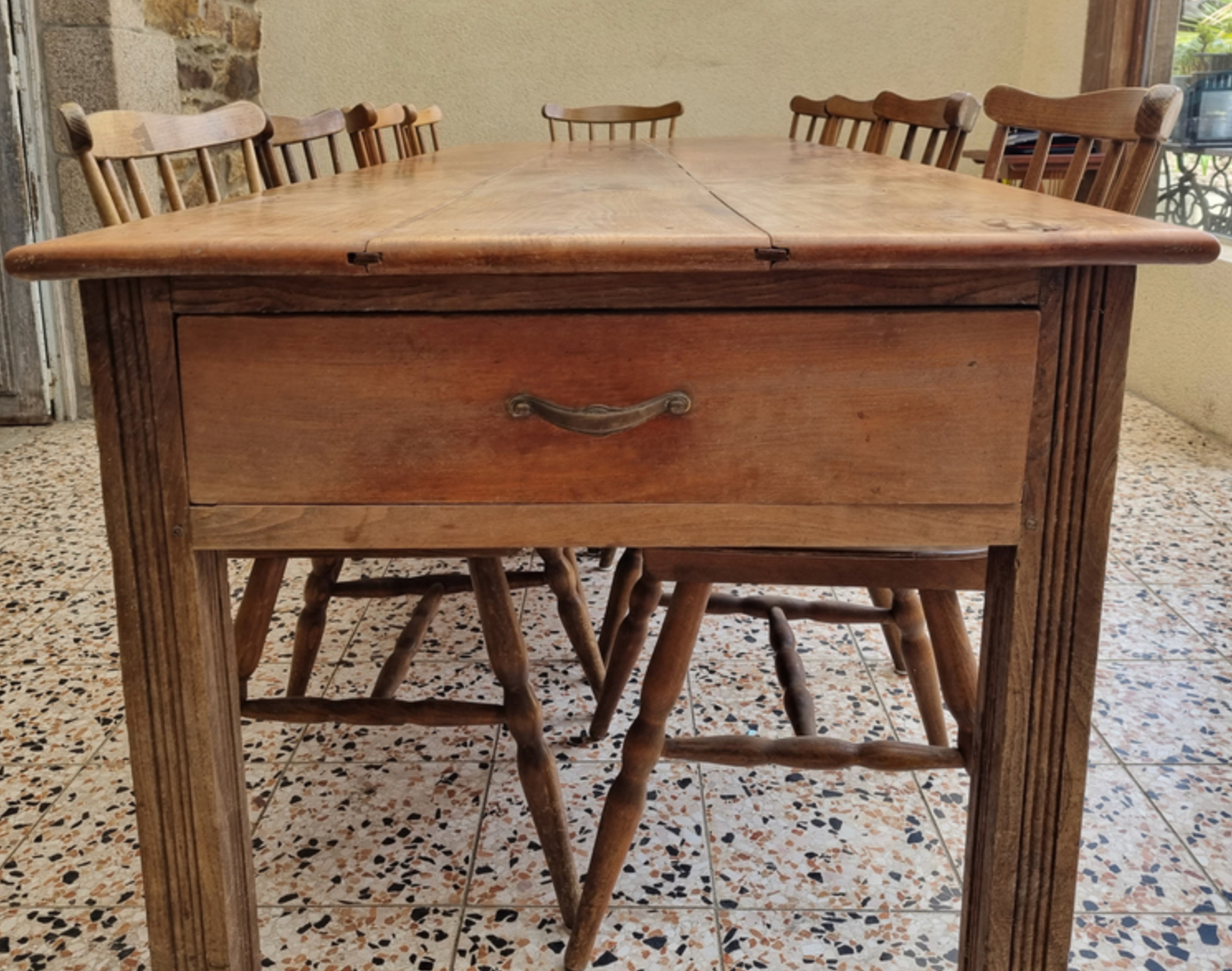 Solid oak farmhouse table, a drawer, vintage, early twentieth century.
