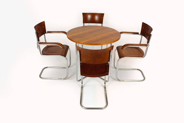 Table ronde et quatre chaises Bauhaus en acier tubulaire restaurées par M. Stam, années 1930