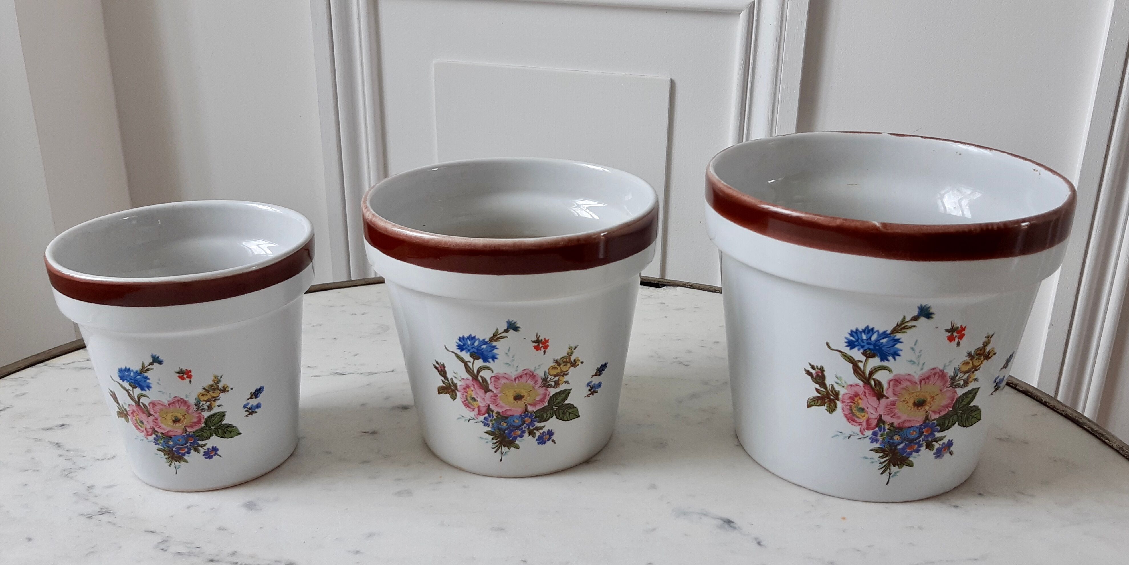Trio of vintage flowered pot covers 60s