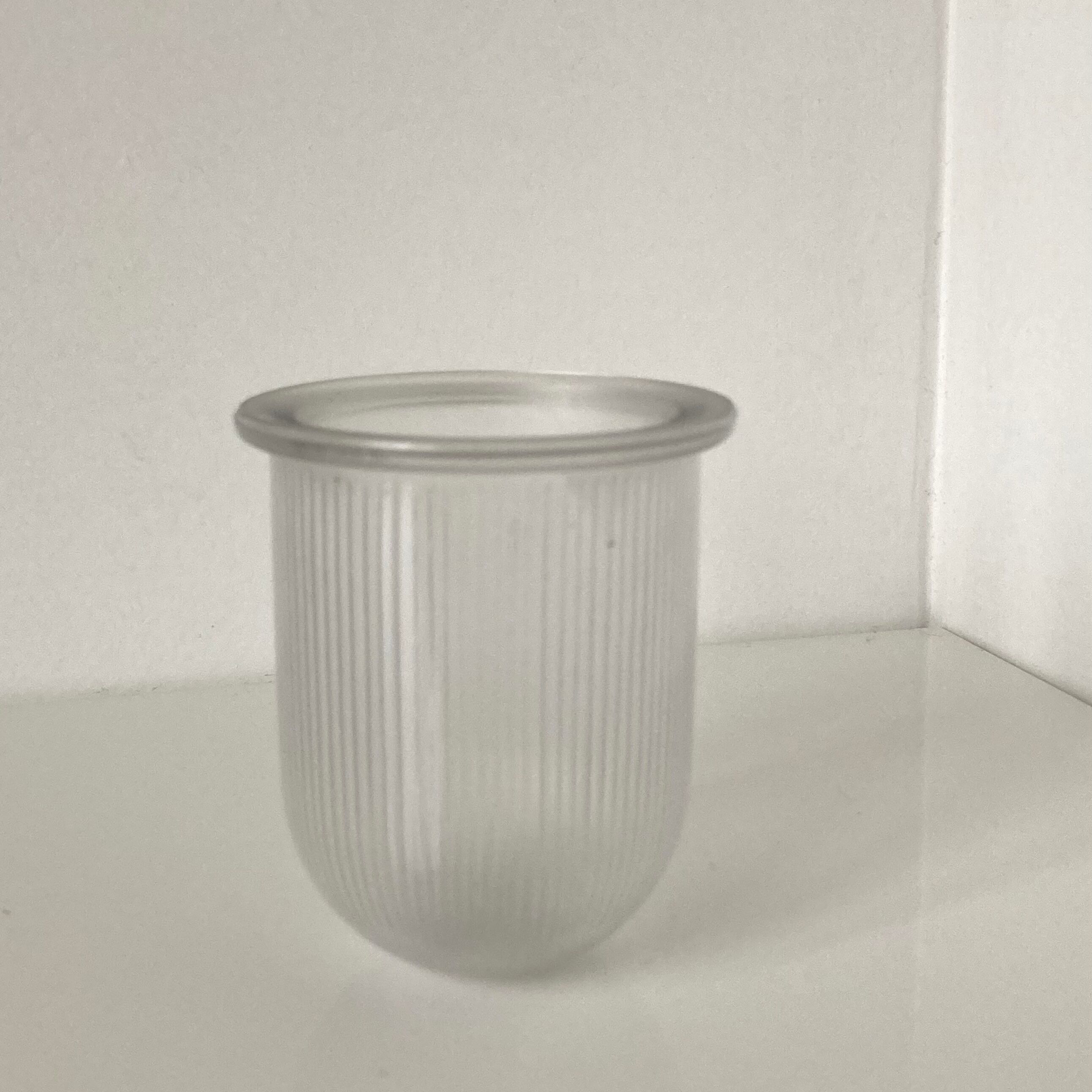 Small art deco vase in pressed and molded glass