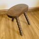 Tabouret vintage à pieds bobines