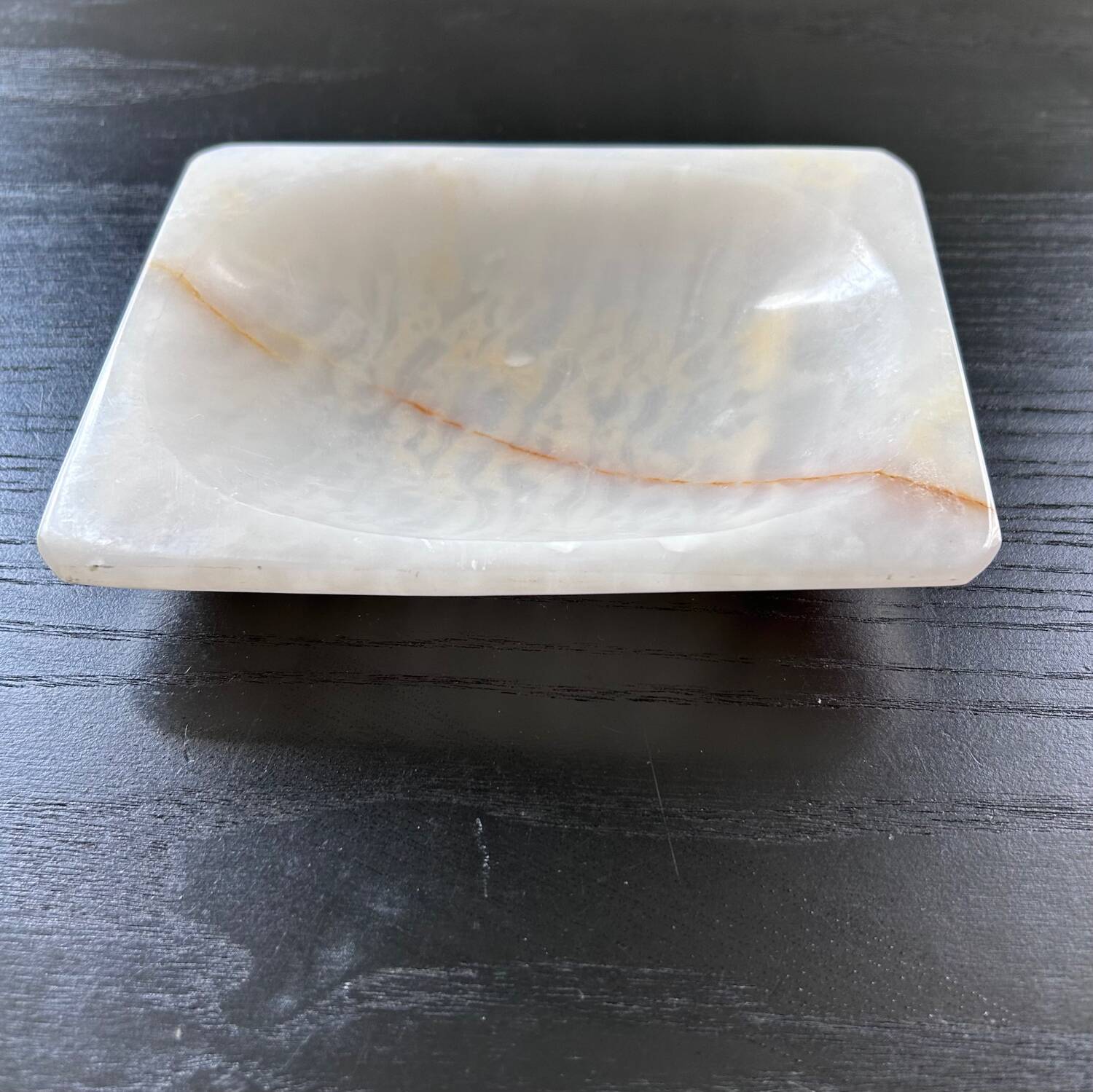 White onyx pocket emptier