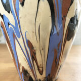 Vase dripping in varnished earth
