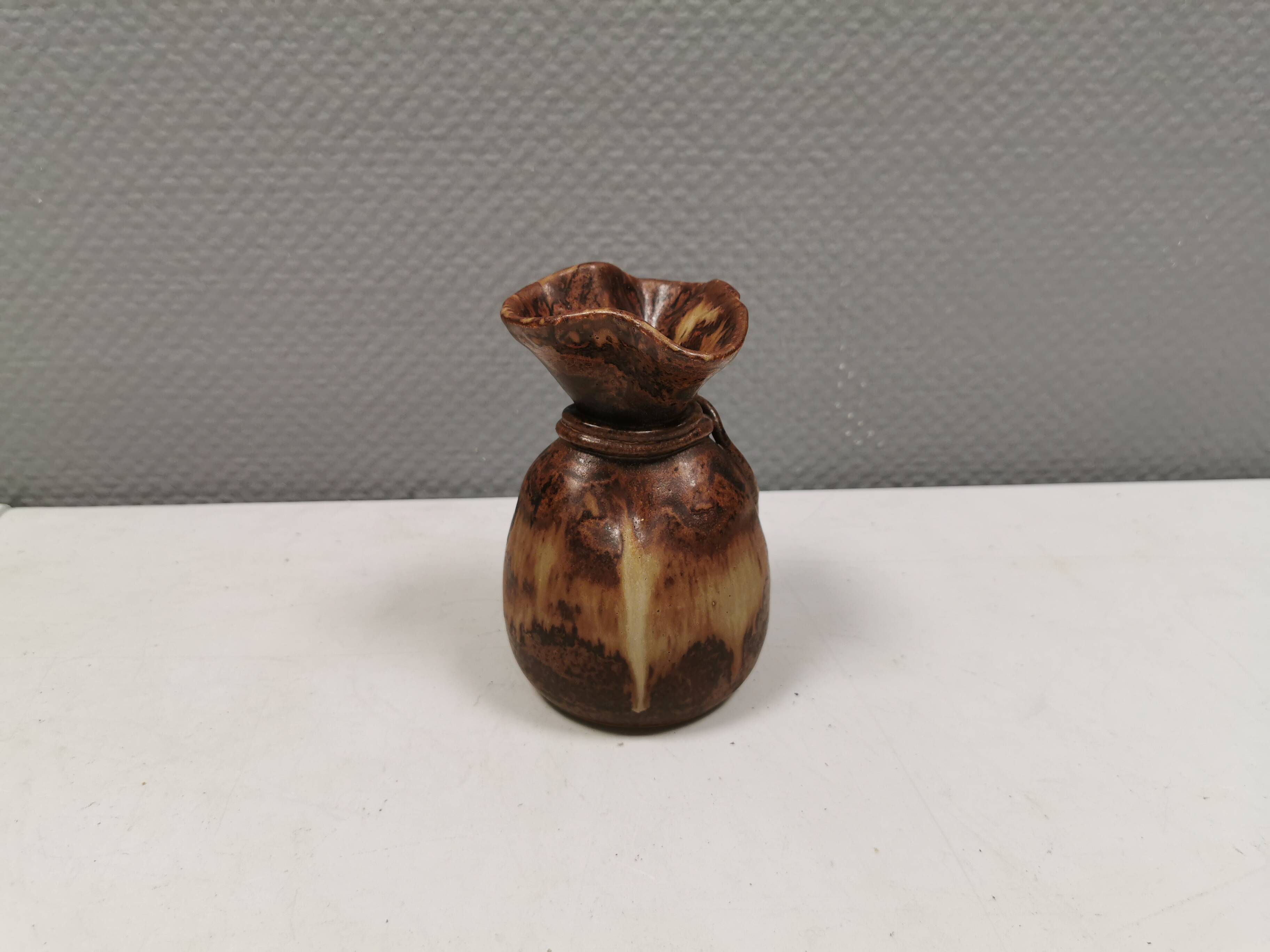 vase shaped like a money bag, in beautiful earthy colours.