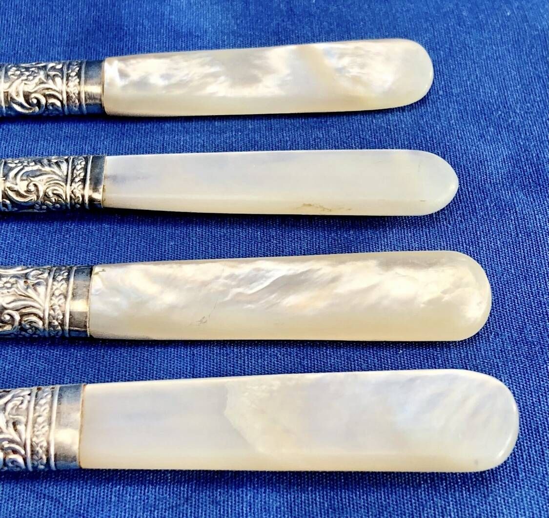 4 antique butter spreading knives in silver-plated metal and mother-of-pearl.