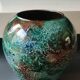Large signed Line Lacquered Ball Vase. Made of églomisé glass. Dimensions: 18 x 16 cm