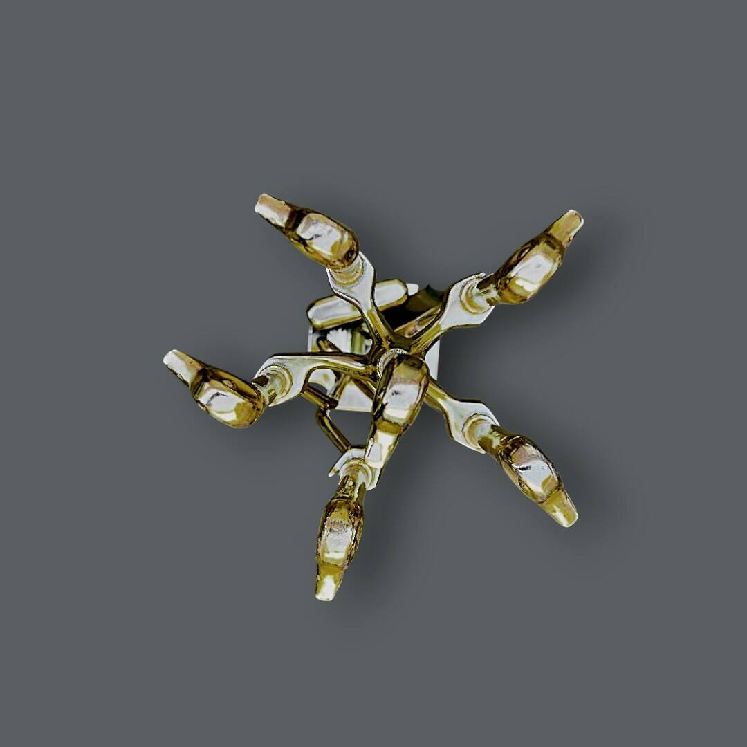 Antique fireplace tool in gilded zamak with duck head designs.