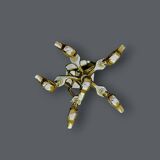 Antique fireplace tool in gilded zamak with duck head designs.