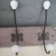 Wall coat rack in wood and porcelain