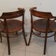 Pair of curved wooden armchairs