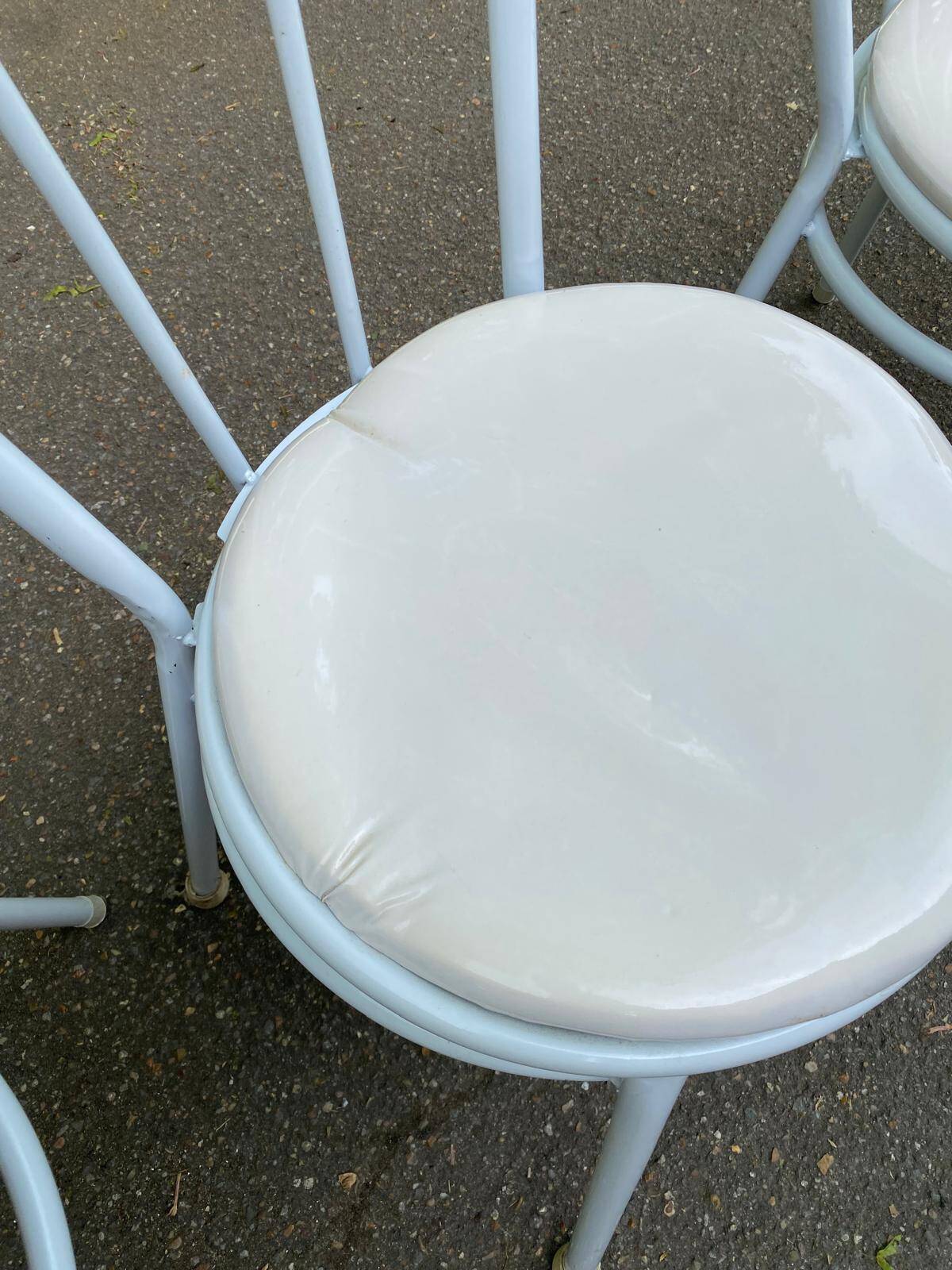 3 white steel and beige leather bistro chairs