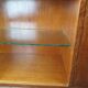 Renovated oak display cabinet with a bar on slanted legs