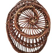 Vintage wicker basket with openwork, sun weaving and large handle.