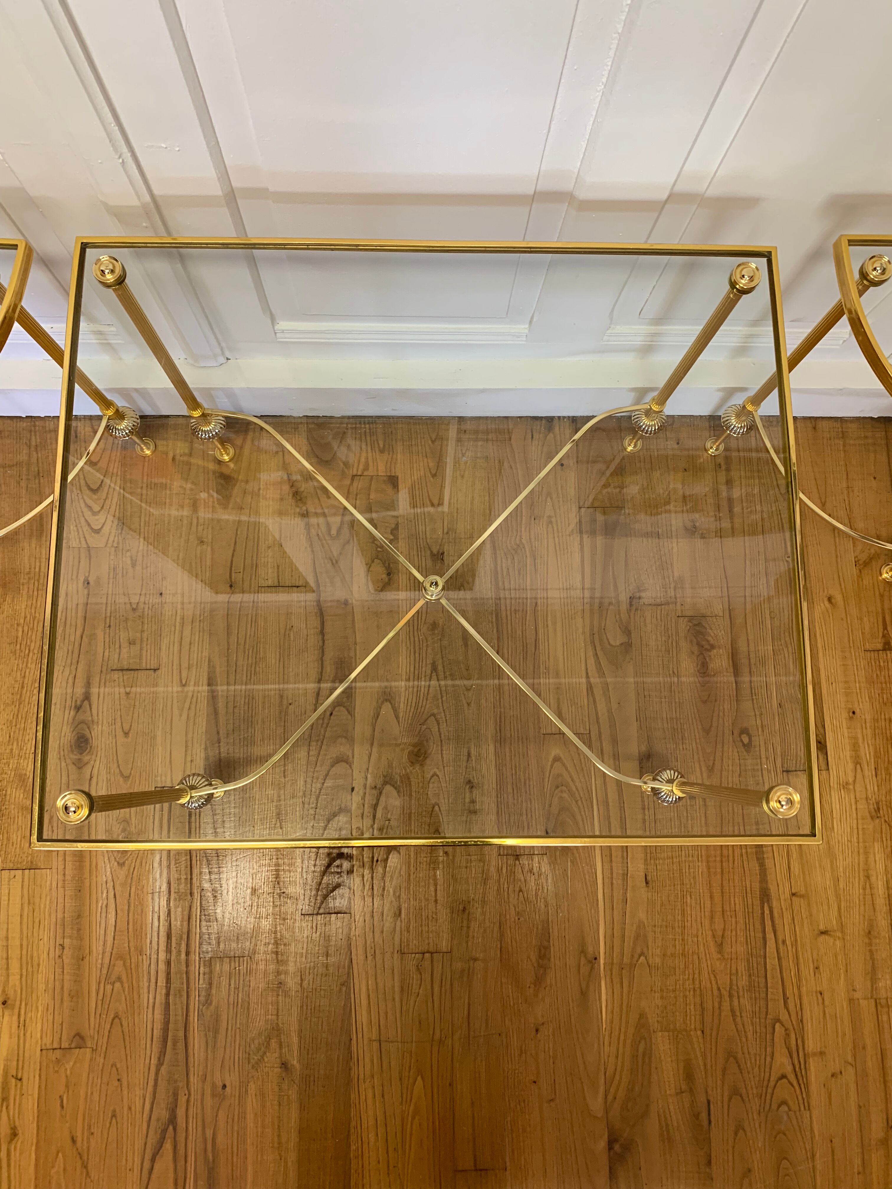 Tripartite brass and glass coffee table