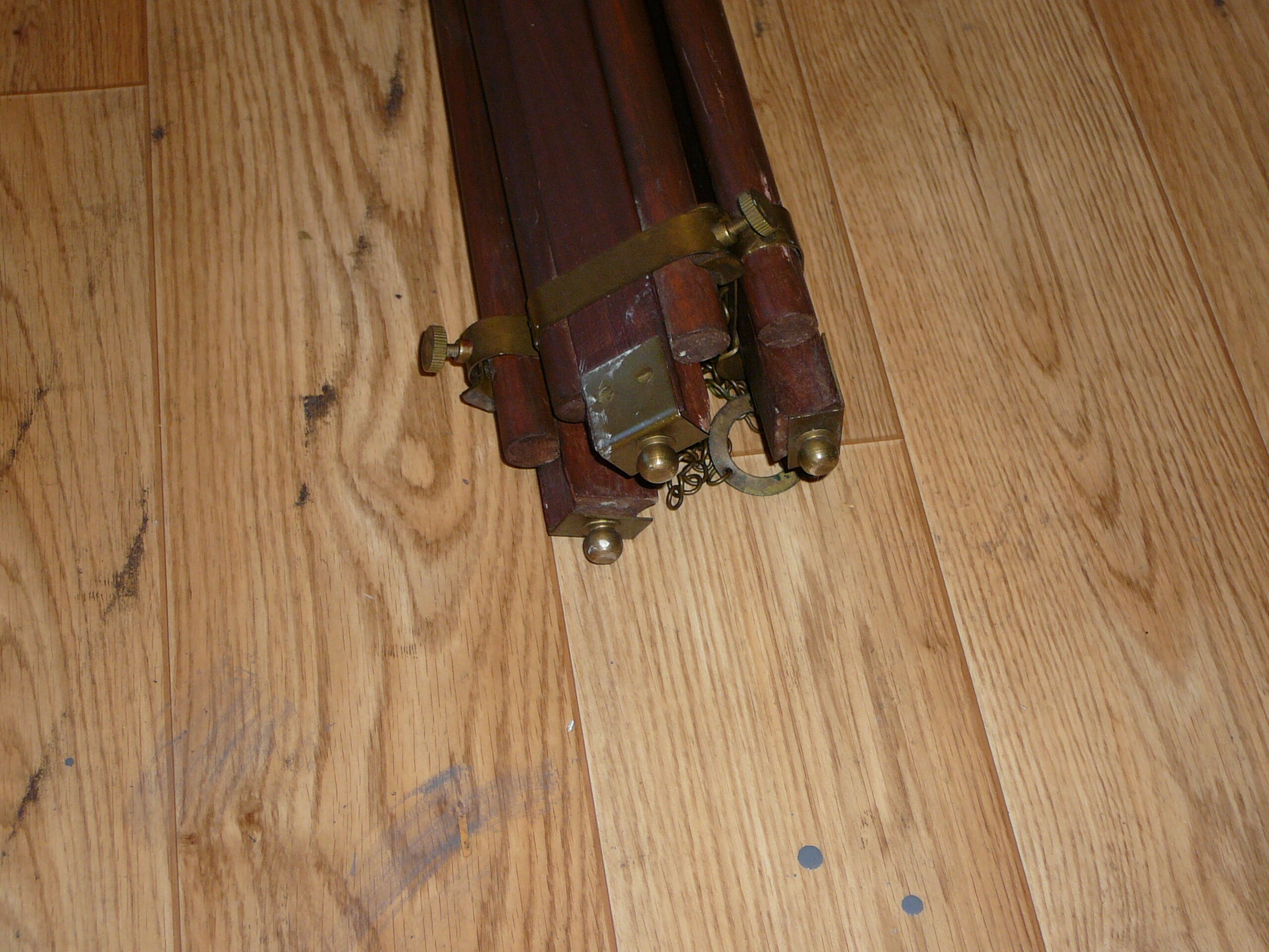 Ancient wooden tripod and brass with its indus lamp