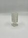 Vintage vase on a pedestal made of cut and frosted glass.