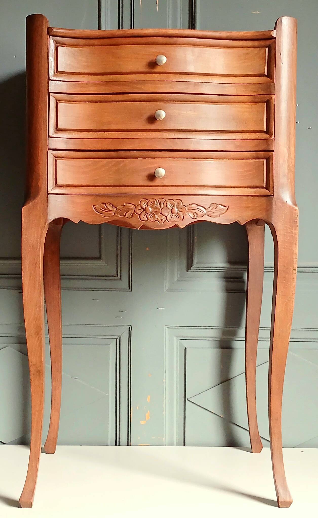 Curved fruitwood chiffonnier in Louis XV style.