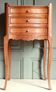 Curved fruitwood chiffonnier in Louis XV style.