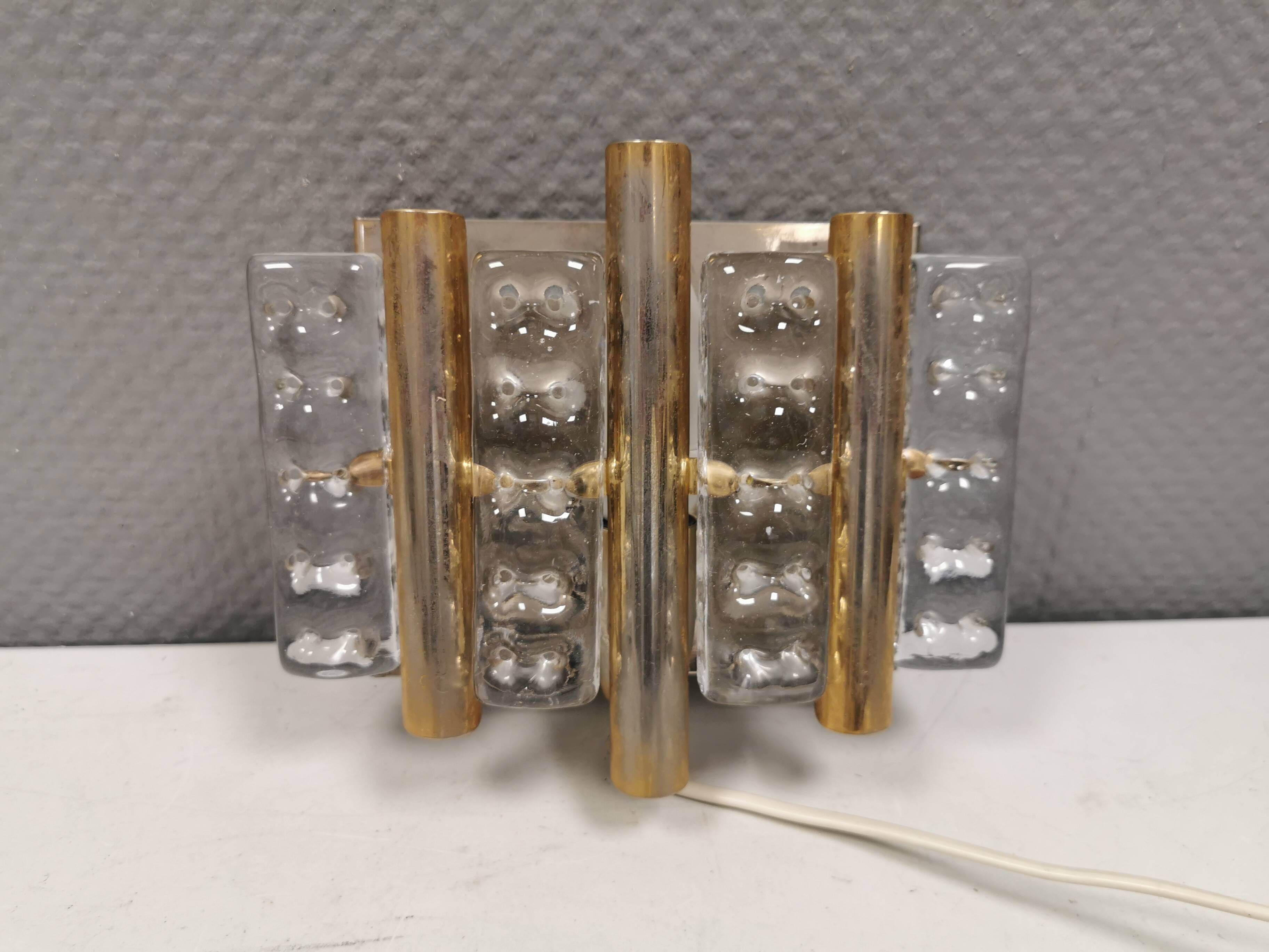 Old Swedish wall lamp, made of hard pressed glass, brass and metal 1960s