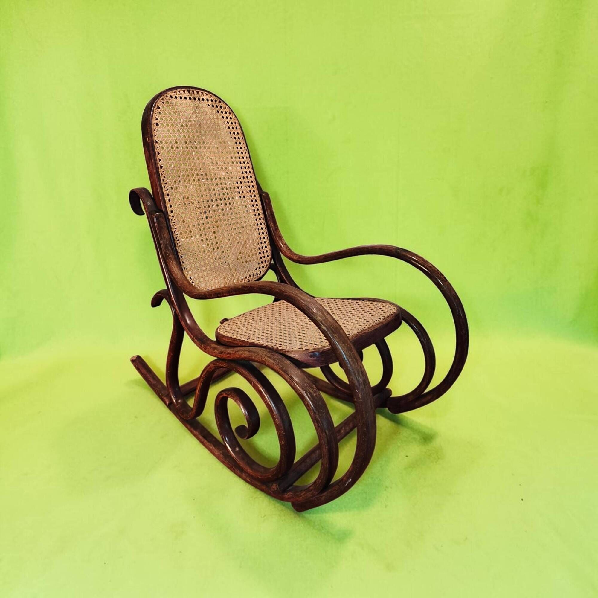 Antique curved wooden rocking chair with caning in Thonet style - Child size