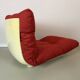Vintage red shell lounge chairs from the 70s mid-century retro.