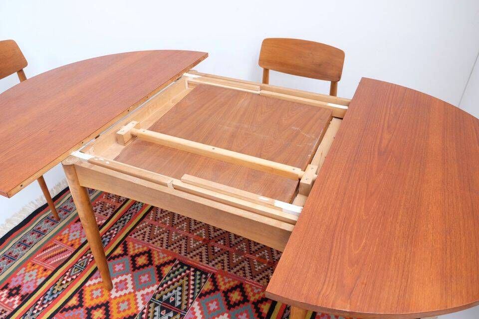 1960s/70s-style teak dining table by ASKO, with a retro vintage design.