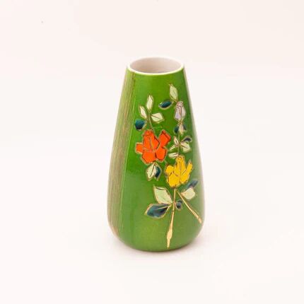 Art Deco porcelain vase in green with floral patterns.