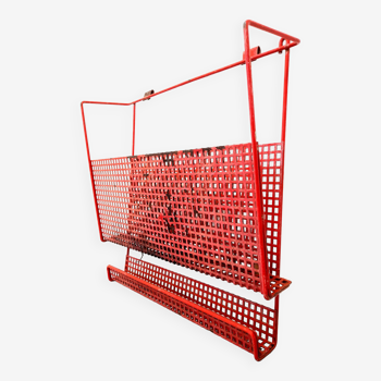 Vintage magazine rack in red lacquered perforated metal from the 70s