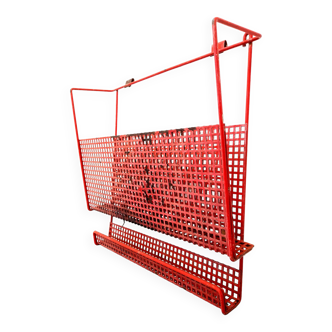 Vintage magazine rack in red lacquered perforated metal from the 70s