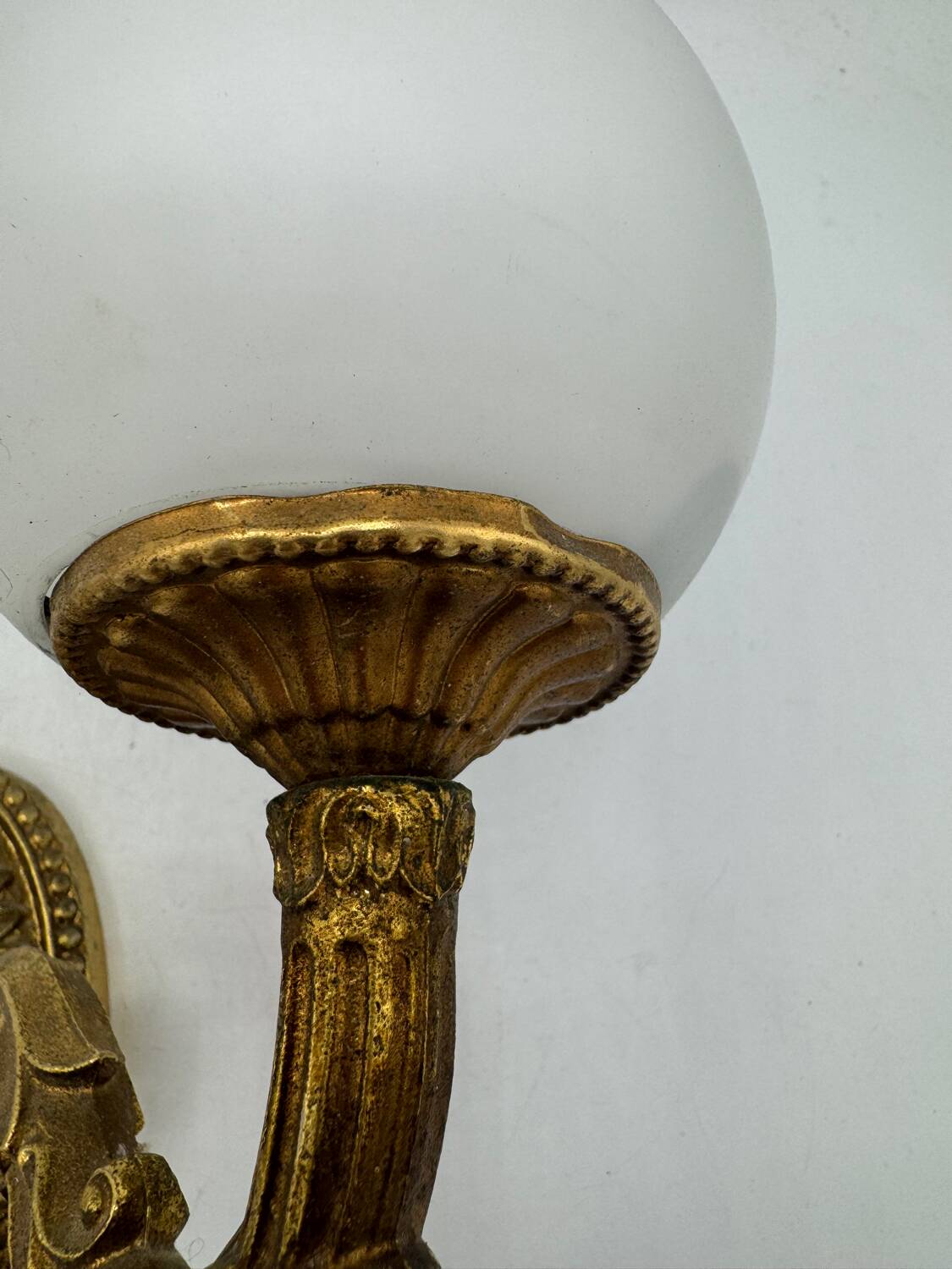 Double gold wall light