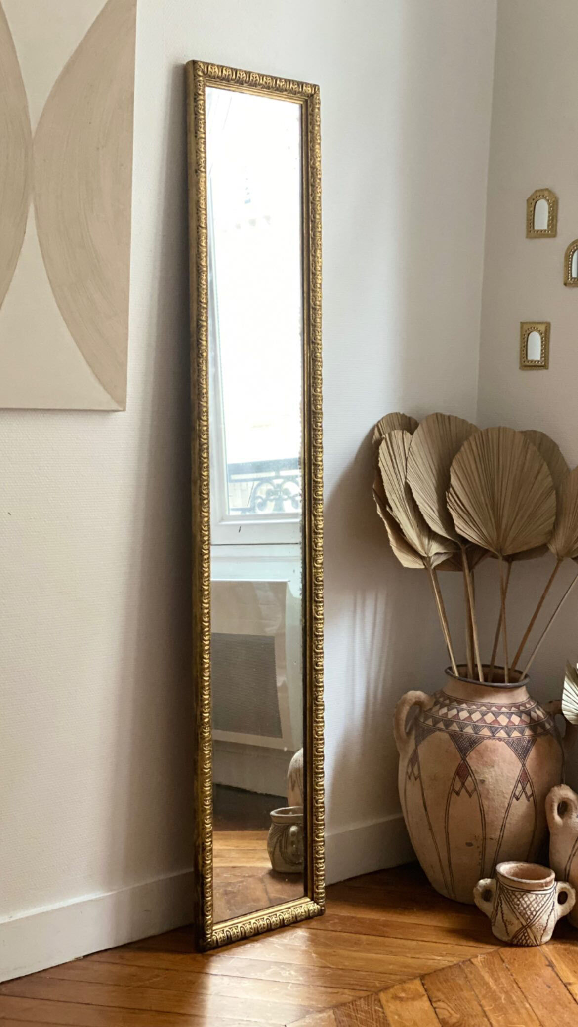 Old rectangular mirror between two golden Louis Philippe