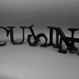 "kitchen" lettering set in blackened metal