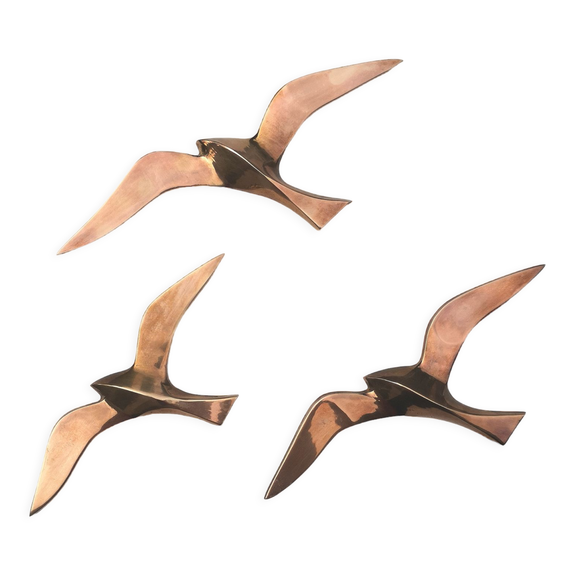 Birds stylized in brass