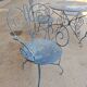 Ensemble de jardin 4 fauteuils et une table en fer forgé