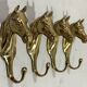 Brass horses coat hooks 1960’s, set of 4