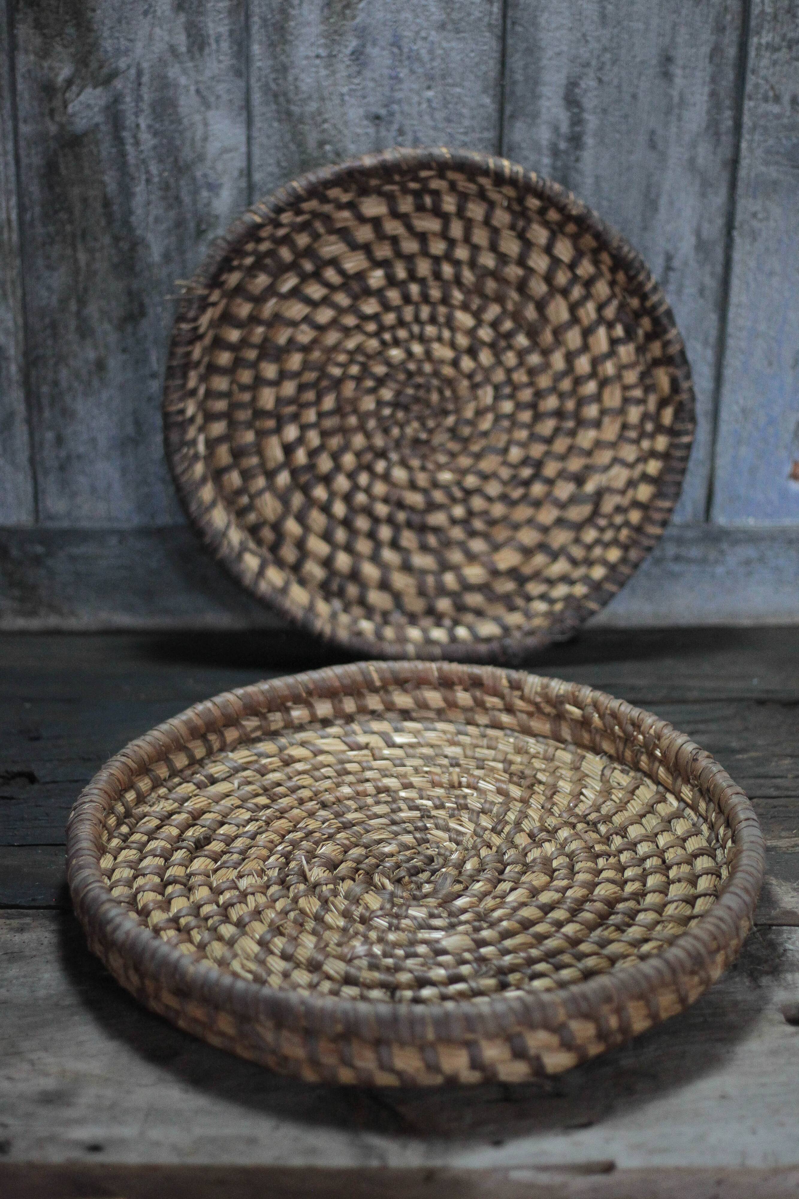 pair of old wicker trays, straw bourgne and bramble, woven bowl