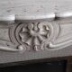 Louis XV style fireplace in veined white Carrara marble and XI ceramics.