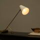 Mid Century adjustable table lamp with perforated shade from the 1950s.