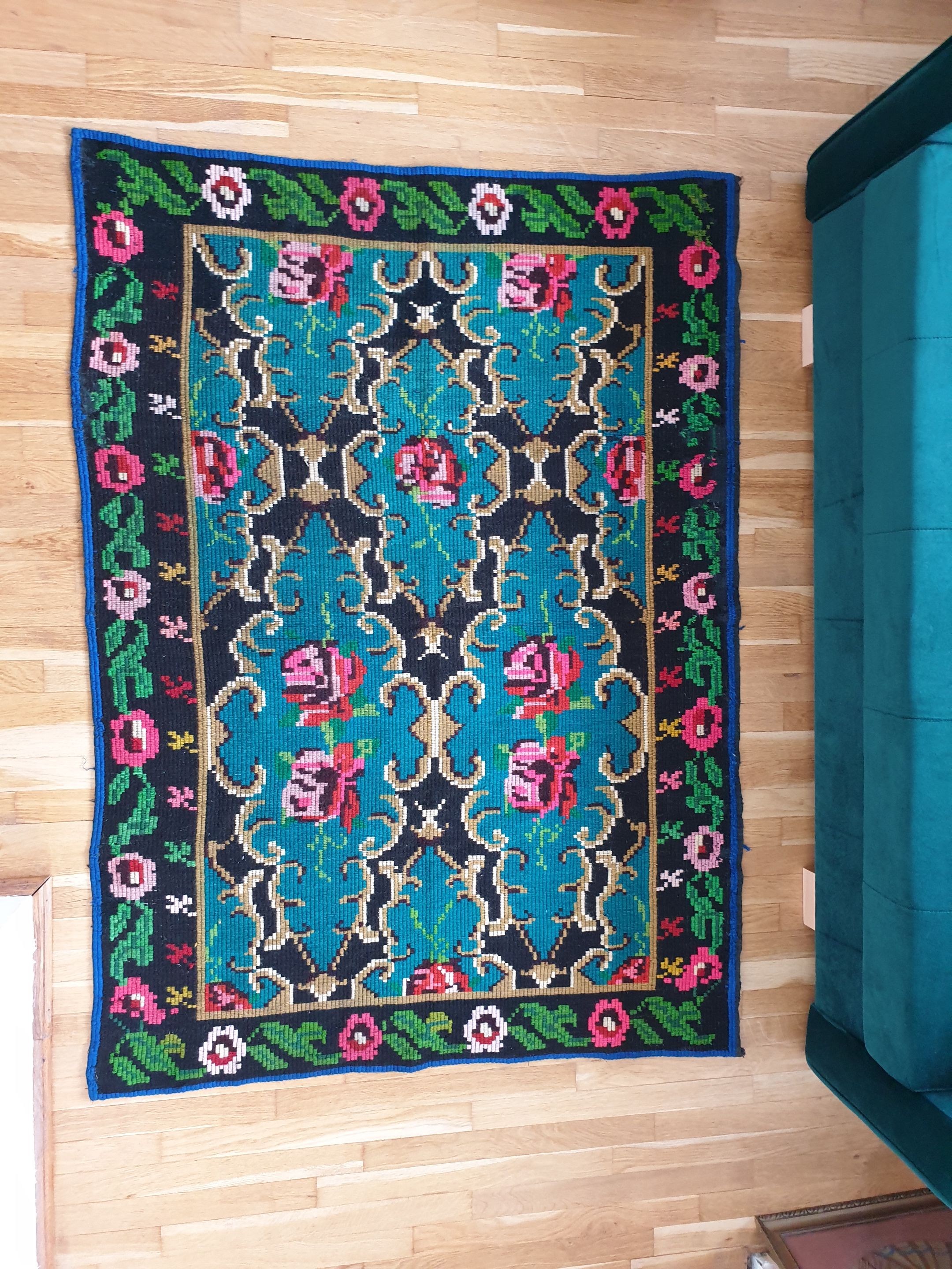 Bohemian blue handwoven carpet with roses made in Romania