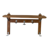 Wall-mounted coat rack with vintage hooks