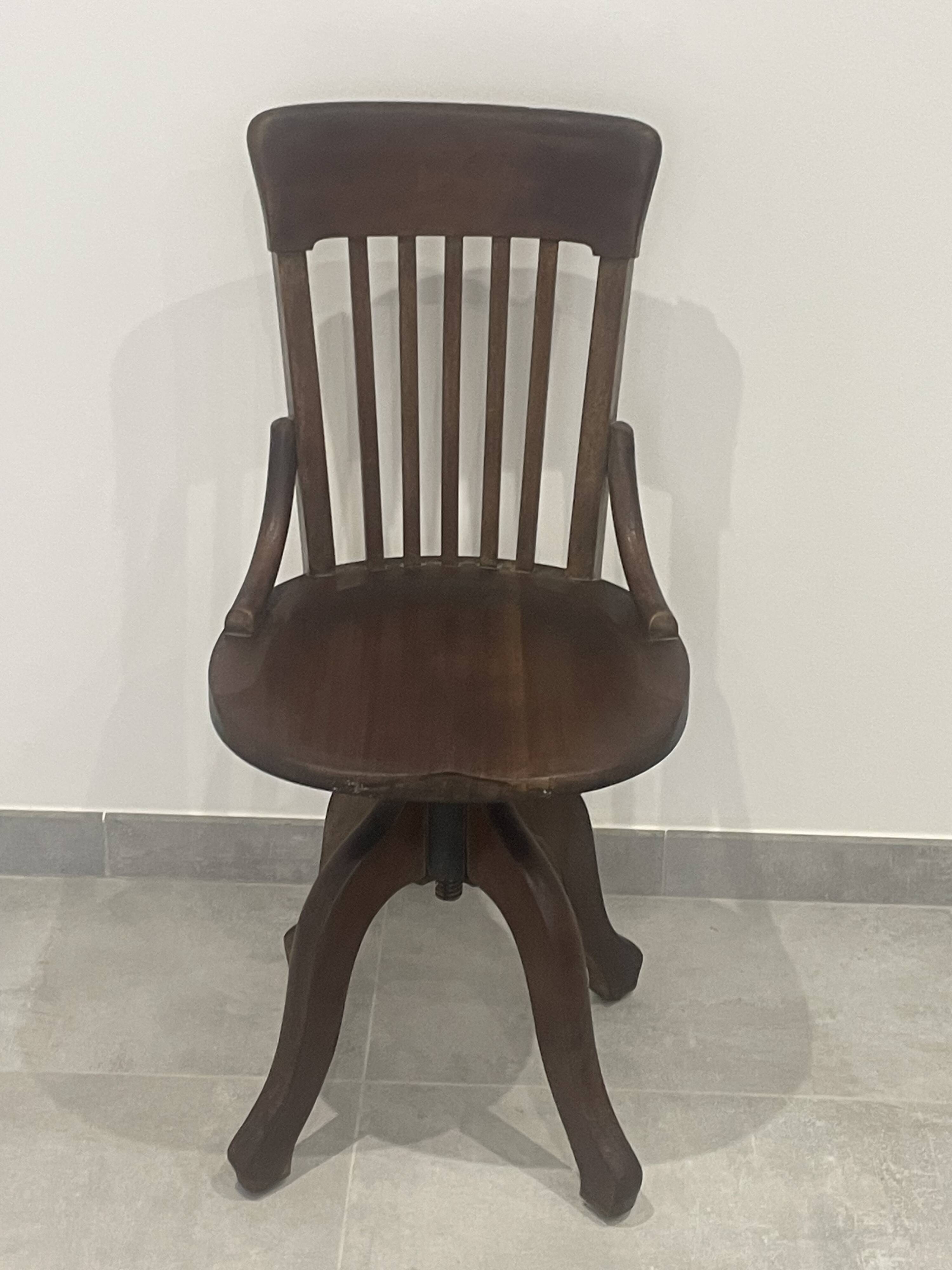 Baumann 1920 rotating office chair with adjustment screw