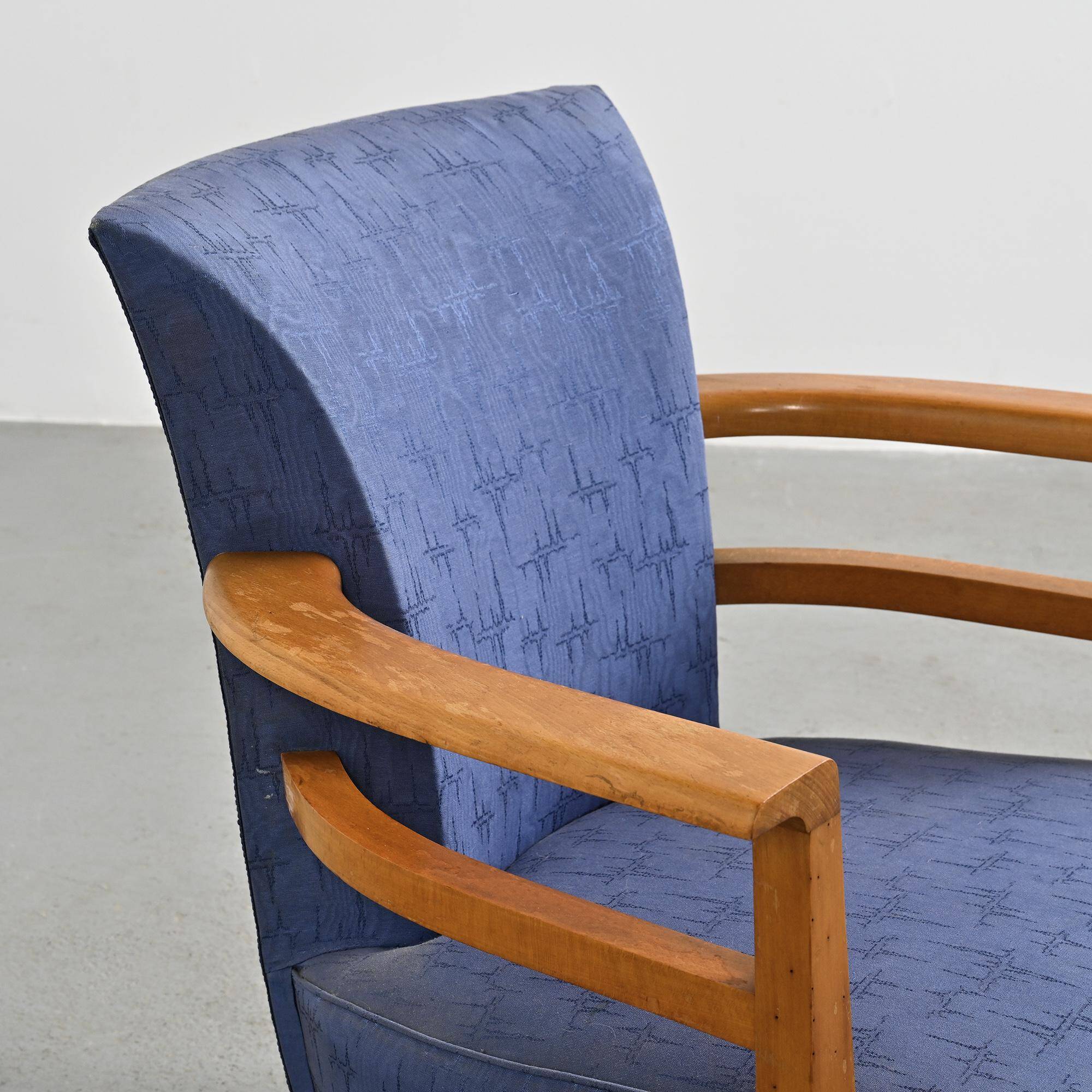 Pair of living room armchairs in solid beech, France, circa 1950.