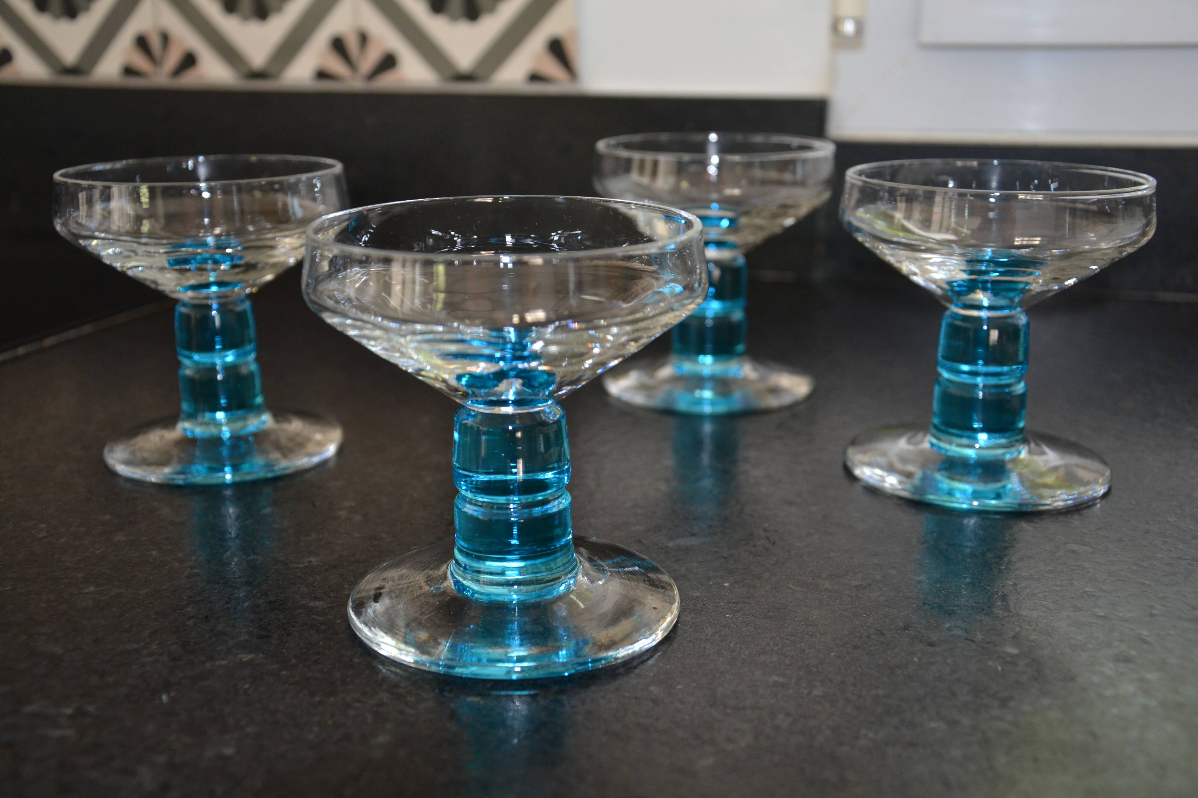 4 vintage blue footed champagne glasses