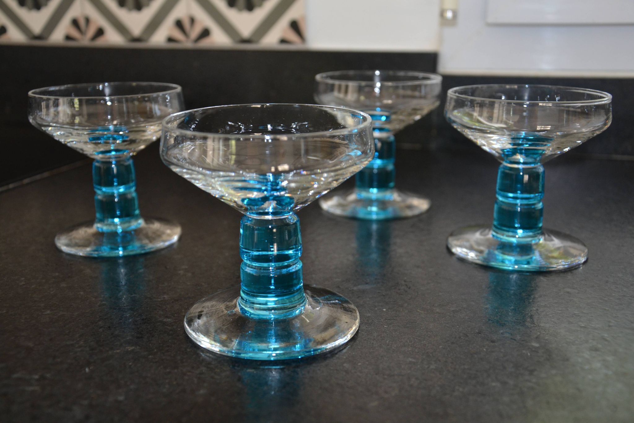 4 vintage blue footed champagne glasses